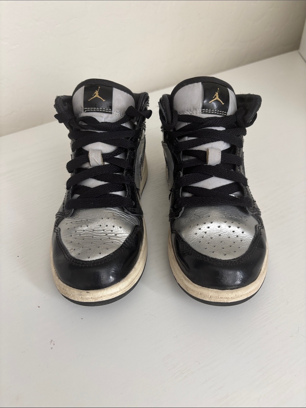 Jordan Kids High-Top Sneakers in Black and Silver with Gold Jumpman